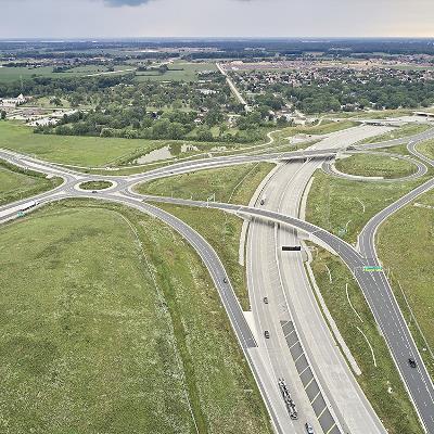 Aerial photo of Rt. Hon. Herb Gray Parkway with roundabout, overpasses and greenspace