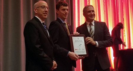 Group of professionals receiving a Canadian Consulting Engineering Award