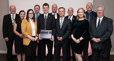 Group of professionals receiving a Canadian Consulting Engineering Award