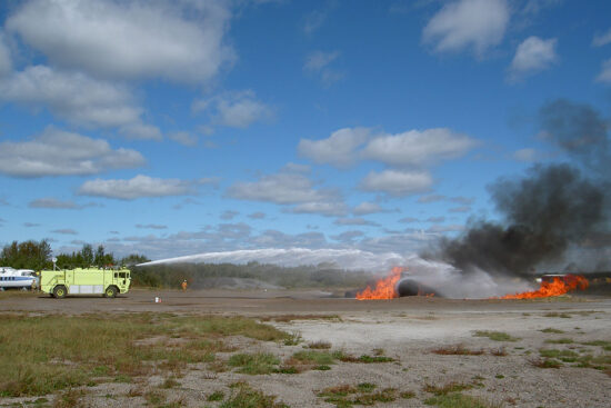 firetruck putting out fire during a training exercise
