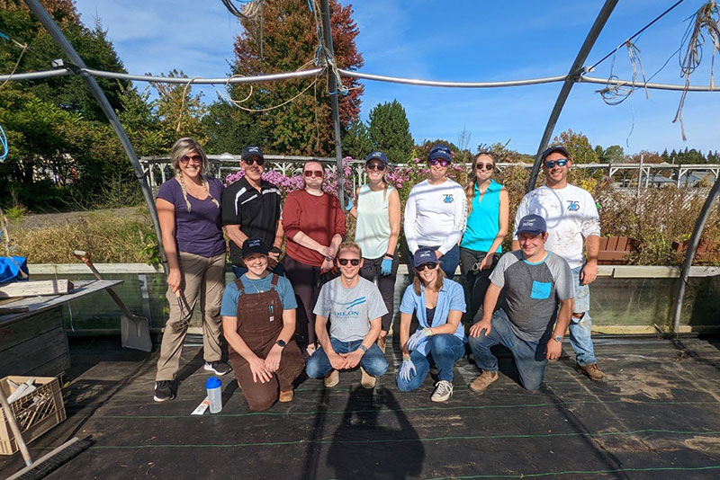 Volunteers at the Fredericton Greener Village property