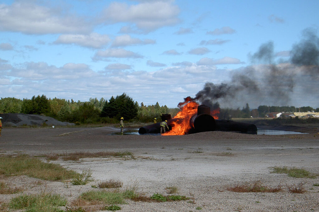 Crew battling fire on a simulated plane