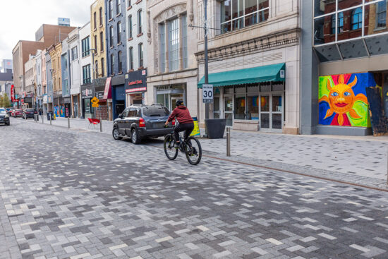 cyclist riding down Dundas Street