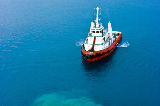 Aerial photo of a push tugger responding to a spill