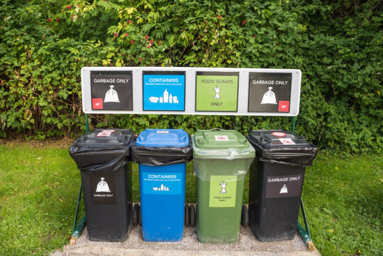 Waste bins for separating waste into proper receptacles